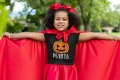 AnyConv.com__t-shirt-mockup-featuring-a-girl-with-a-red-cape-for-halloween-29294.webp