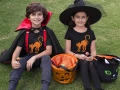 AnyConv.com__t-shirt-mockup-featuring-two-kids-on-halloween-costumes-eating-candy-29313.webp