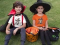 AnyConv.com__t-shirt-mockup-featuring-two-kids-on-halloween-costumes-eating-candy-29313 (1).webp
