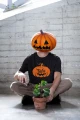 AnyConv.com__halloween-themed-stanley-stella-tee-mockup-of-a-man-with-a-pumpkin-face-m35481.webp
